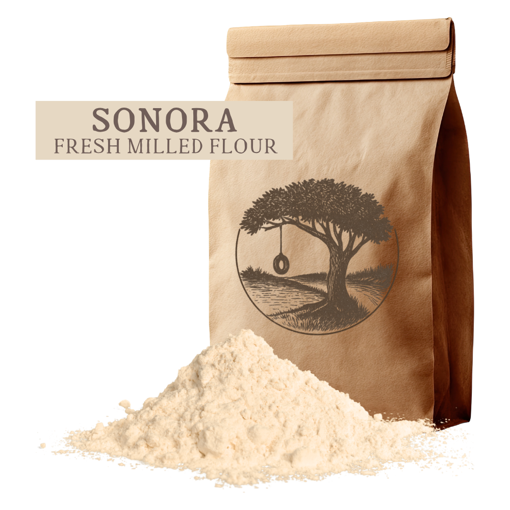 A bag of fresh-milled Sonora White Wheat flour from Fat Uncle Farms. An heirloom choice among healthy grains and whole grain products, perfect for tortillas and organic whole wheat bread. We ship throughout the United States.